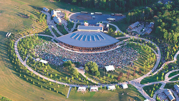 A crowd gathering on the fields of Bethel Woods Center for the Arts festival in the Catskills