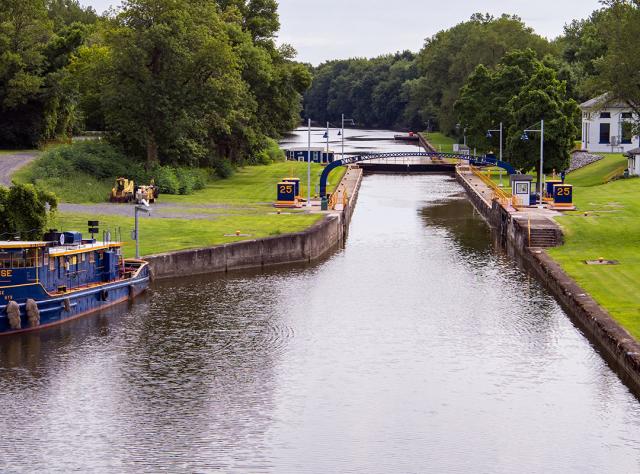 A tugboat floats along the Erie Canal near Lock 25 in Seneca Falls