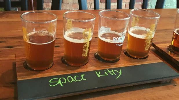 Flight of four beers on table at Rohrbach Brewing Company, Rochester, New York