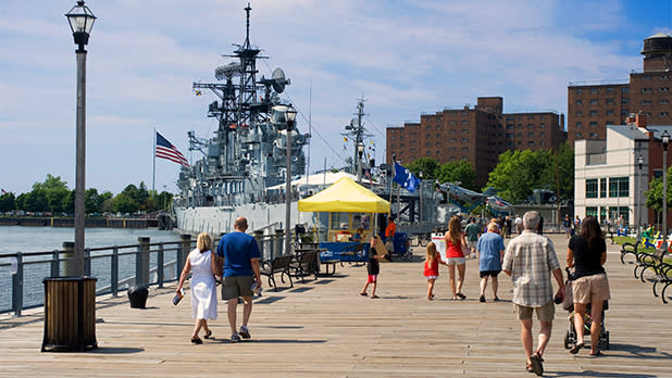 People on the boardwalk at Canalside in Buffalo, NY.