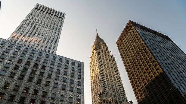 A view looking up at the Chrysler Building and other Manhattan skyscrapers