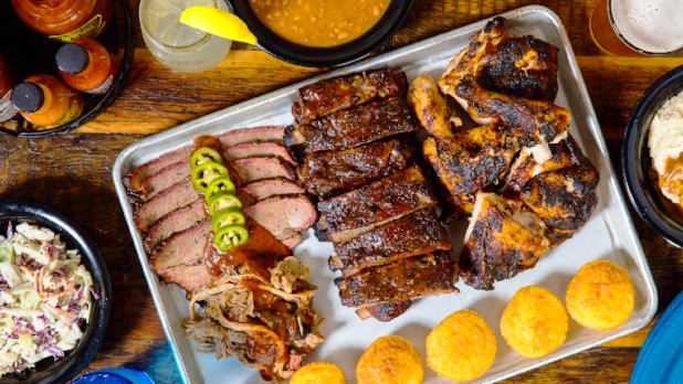 A platter of meat at Dinosaur BBQ in Syracuse, NY