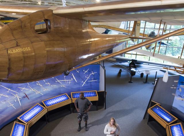 A plane hanging from the ceiling at the National Soaring Museum