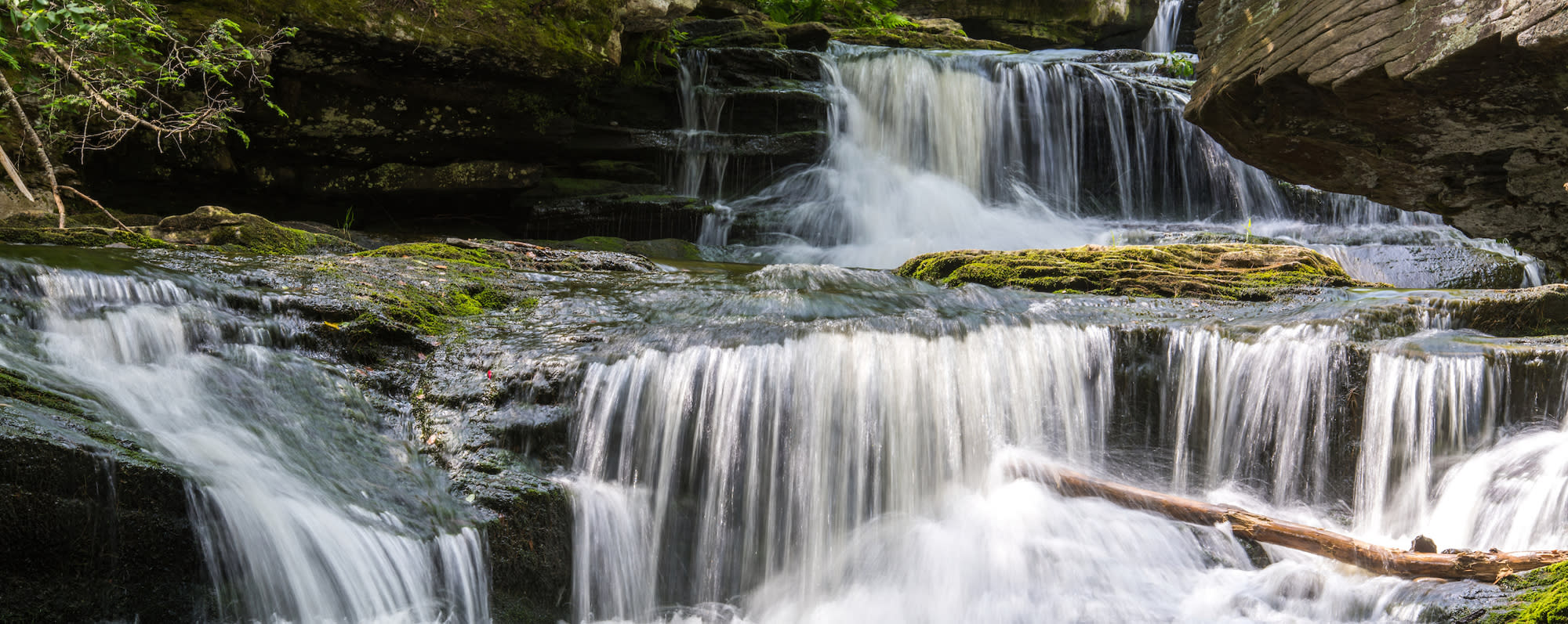 A photo of water cascading down Vernooy Kill Falls