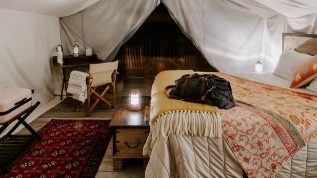 A photo of the interior of a camp tent at Firelight Camps in Ithaca