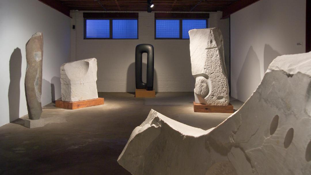 Black and white sculptures in a room at The Noguchi Museum